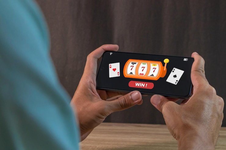 Antarmuka aplikasi mobile atm4d menampilkan slot games Aviator, Sweet Bonanza, dan Gates of Olympus